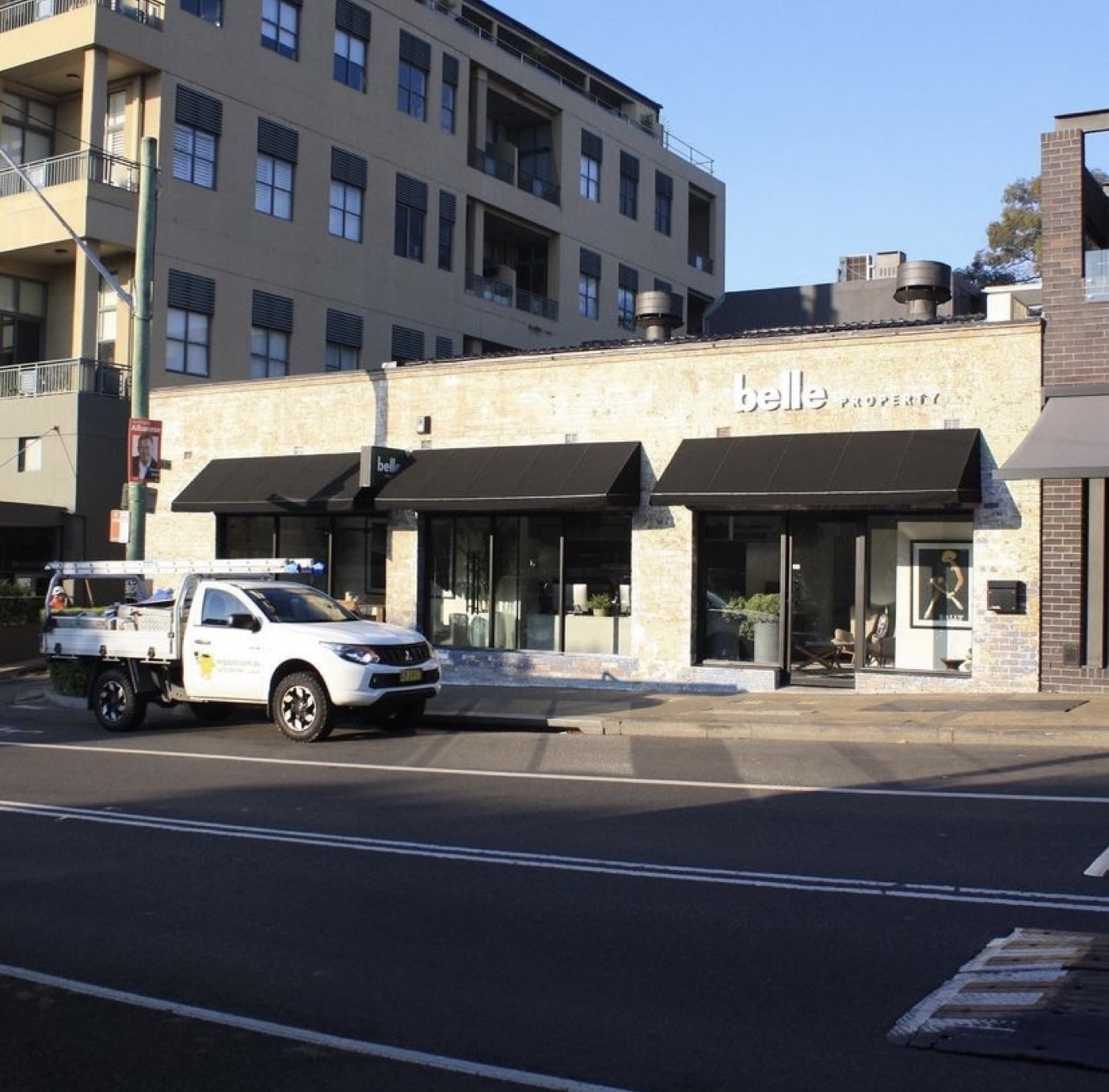 Completed commercial shopfront repaint with MrPaint ute out front