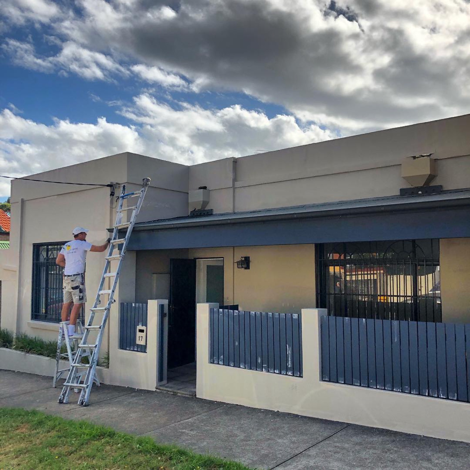 MrPaint painter working in Palm Cove, Cairns